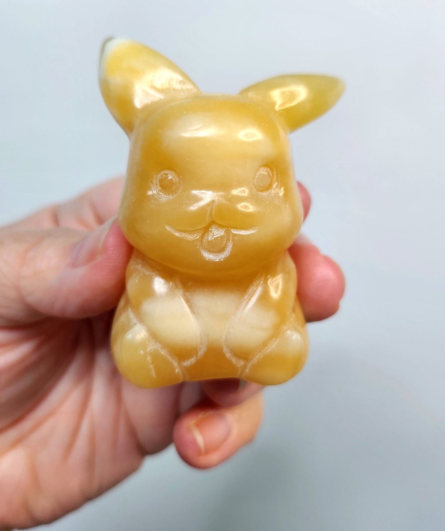 Orange Calcite Pikachu Crystal Carving