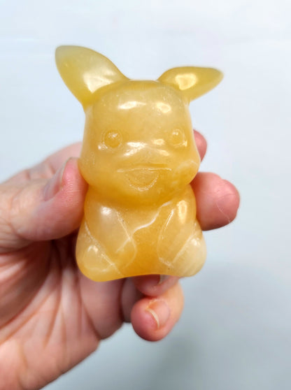 Orange Calcite Pikachu Crystal Carving