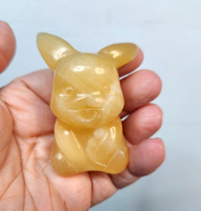 Orange Calcite Pikachu Crystal Carving