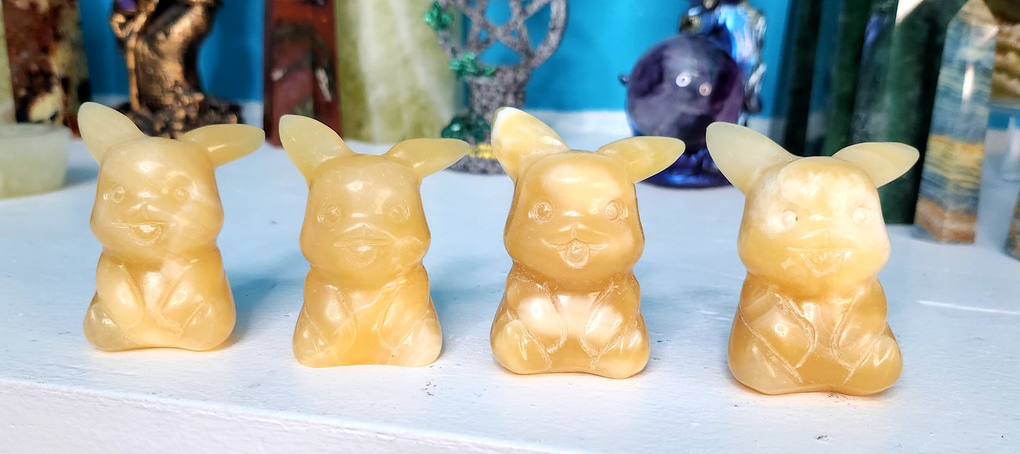 Orange Calcite Pikachu Crystal Carving